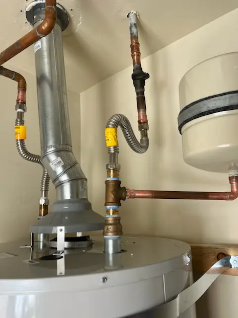 Water heater installation and plumbing repair in Suburban Village